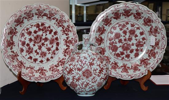 A pair of Chinese underglaze copper red dishes and a similar flask diam 40cm
